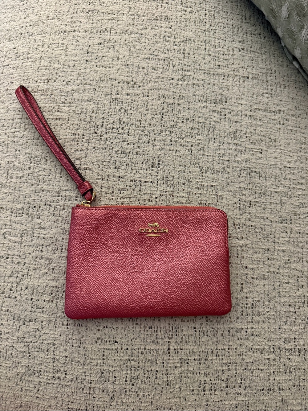 COACH Pink Pebbled Leather Wristlet with Gold Logo